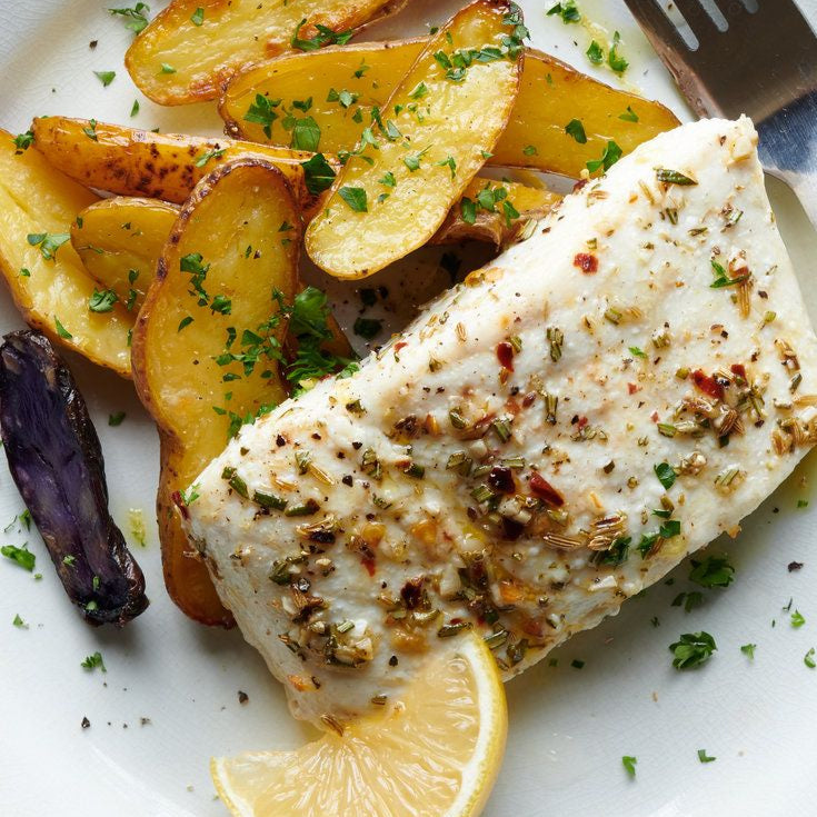 Cooked halibut with lemon and spices